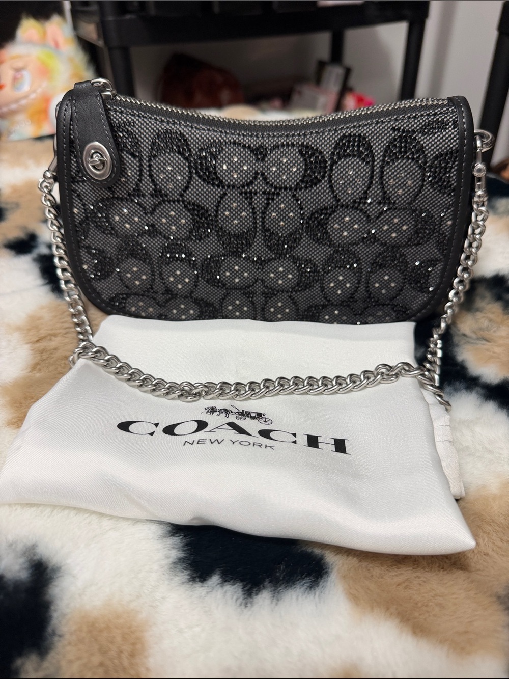 Coach Black Signature black crystal swinger
